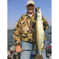 Attorney Bob Steigauf with his first Musky! He caught it on a 400 series spoonplug.